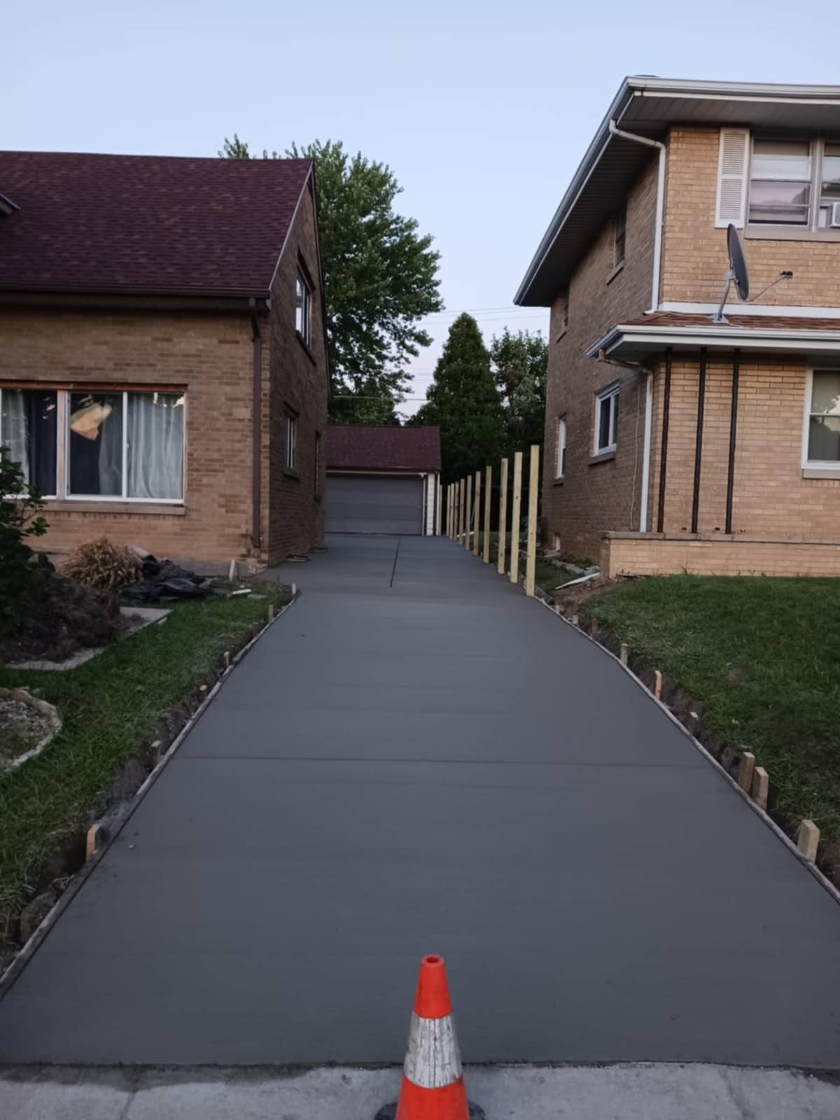 concrete driveway leading to garage