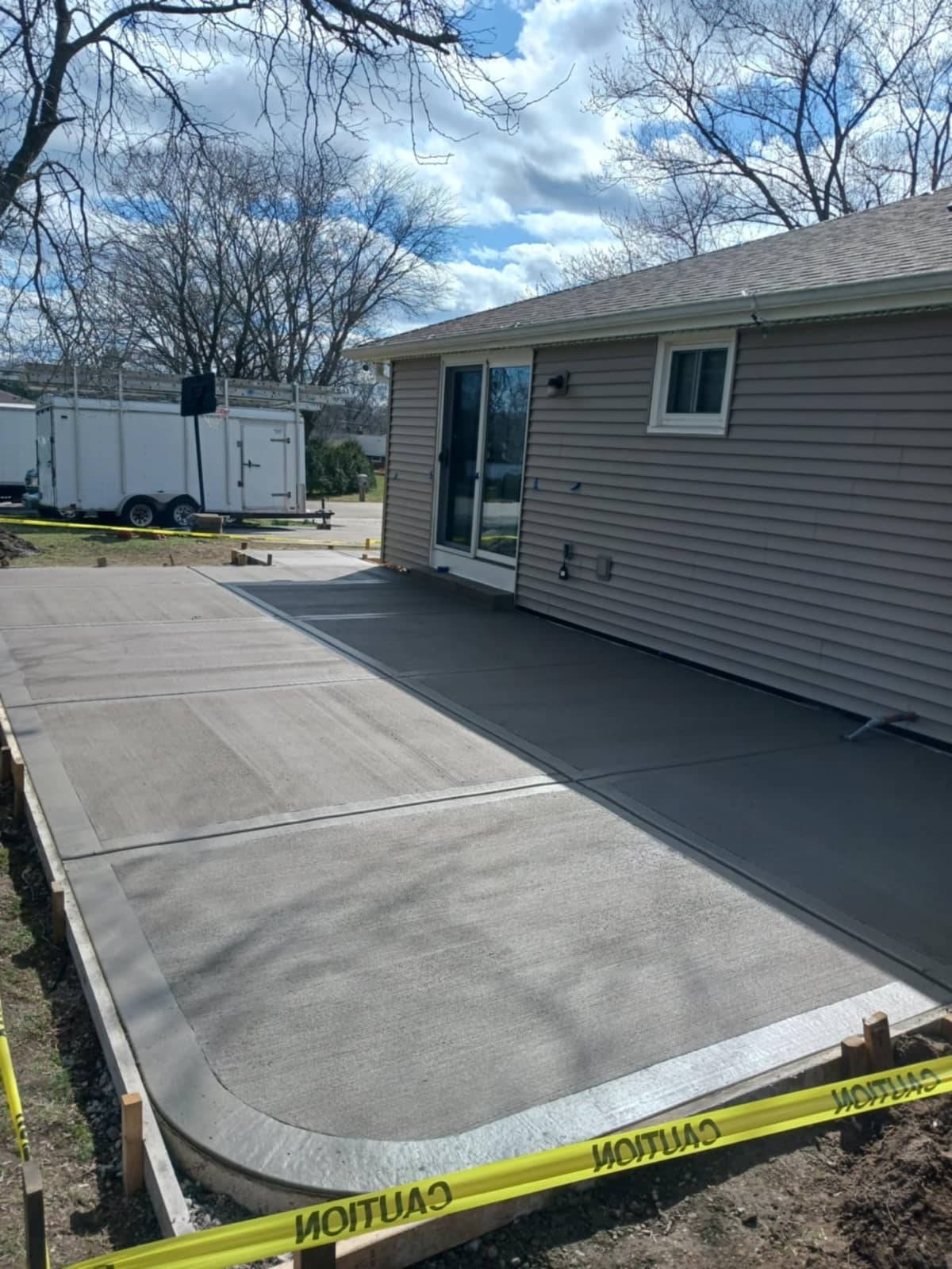 concrete driveway in home backyard