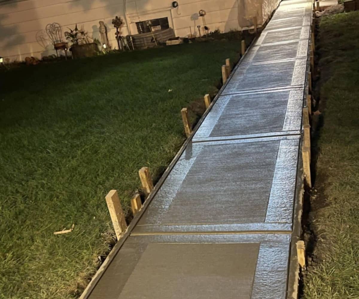 concrete sidewalk with supports