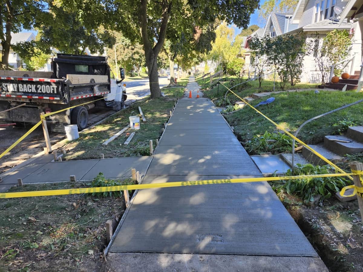entire front of home sidewalk new concrete
